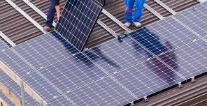 building infrastructure zero emissions Solar Panel and Workers - optimised